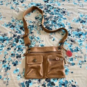 Roots Tribe Village Bag with Tribe Protector Included